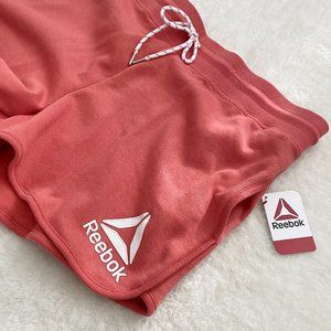 Reebok Women's Plus Size Relaxed Fit Running Short, Coral, XXXL